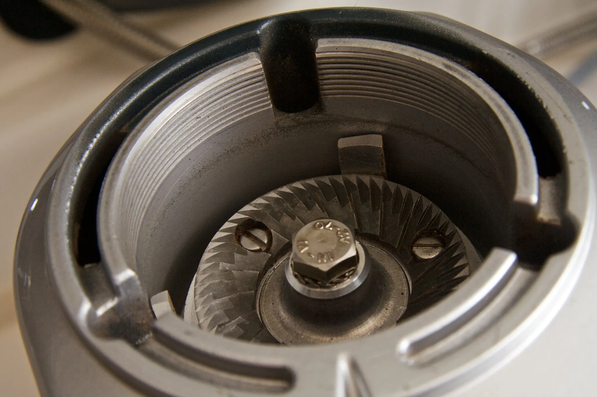 An up close look at a coffee grinder's burr set