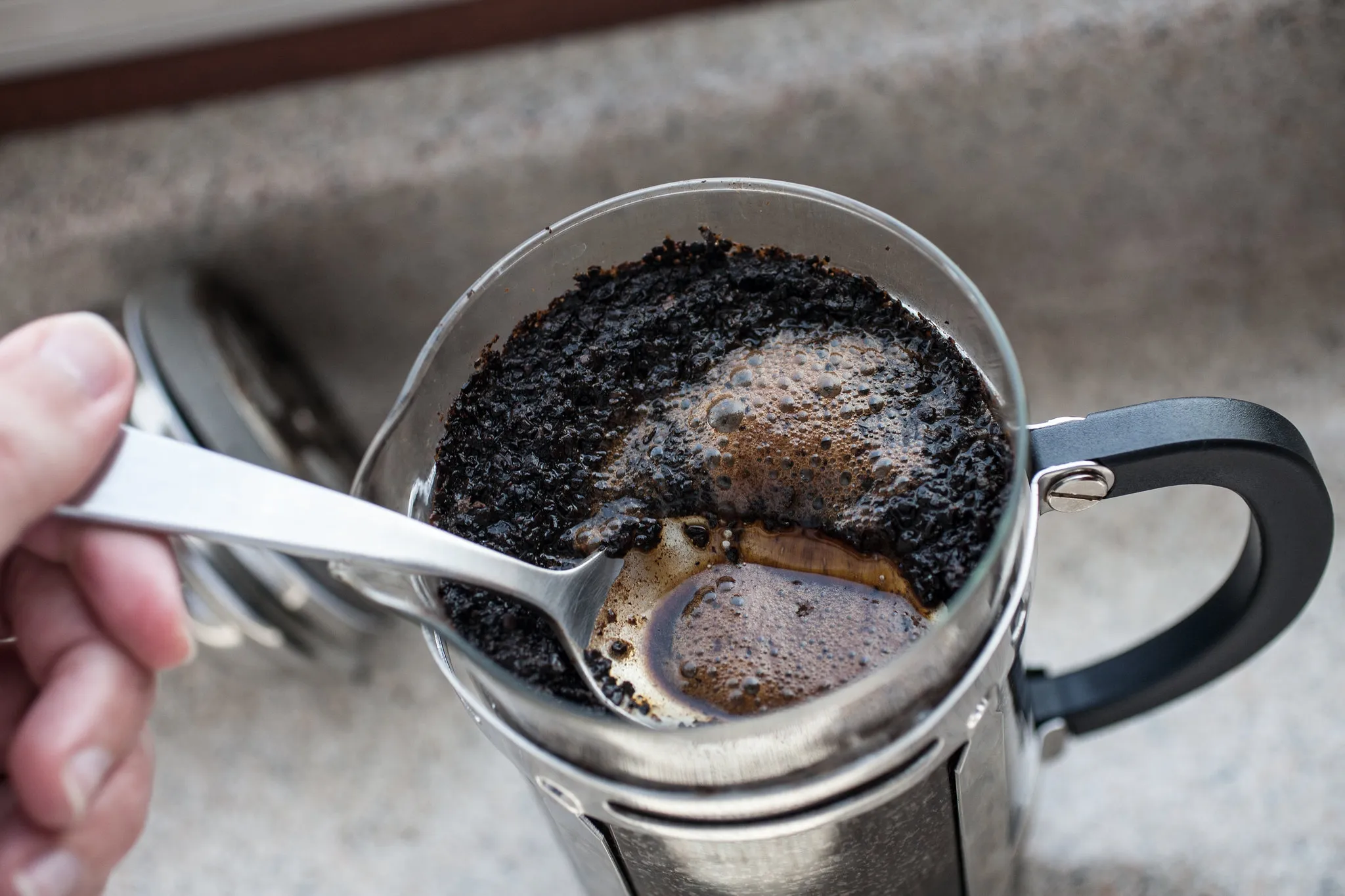 Stirring the slurry in a French press