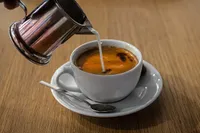 Looking for a unique espresso-based drink? An Americano with milk is a classic and one that you should absolutely try. Learn how to make one in this guide.